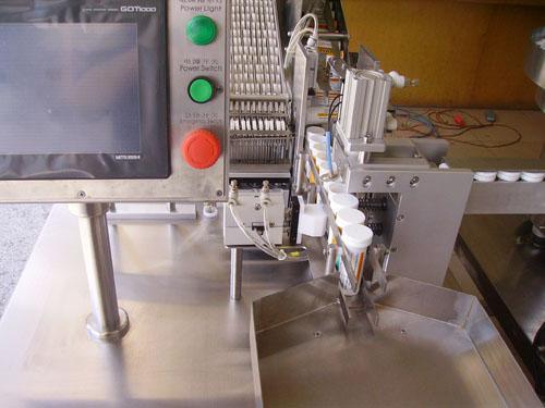 Manufacturing Factory Straight-Bottle Tablet Filling Machine / Effervescent Tablet Packaging Machine (BSP40A)